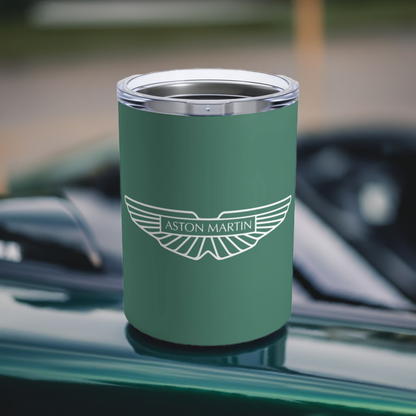 Aston Martin tumbler on car in Racing Green with a white logo.