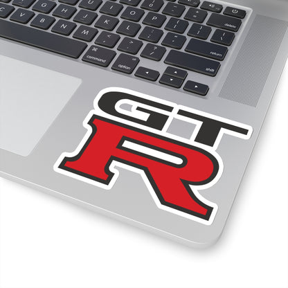 4 inch white GTR sticker on a silver laptop