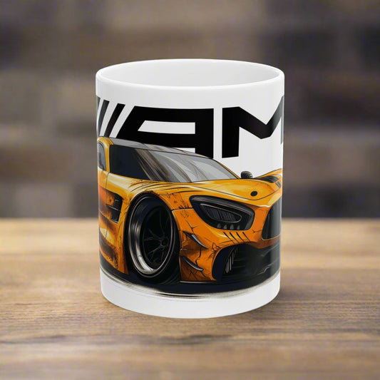 11oz White Coffee Mug with a Solarbeam Yellow AMG GT with the AMG Logo placed behind the car.