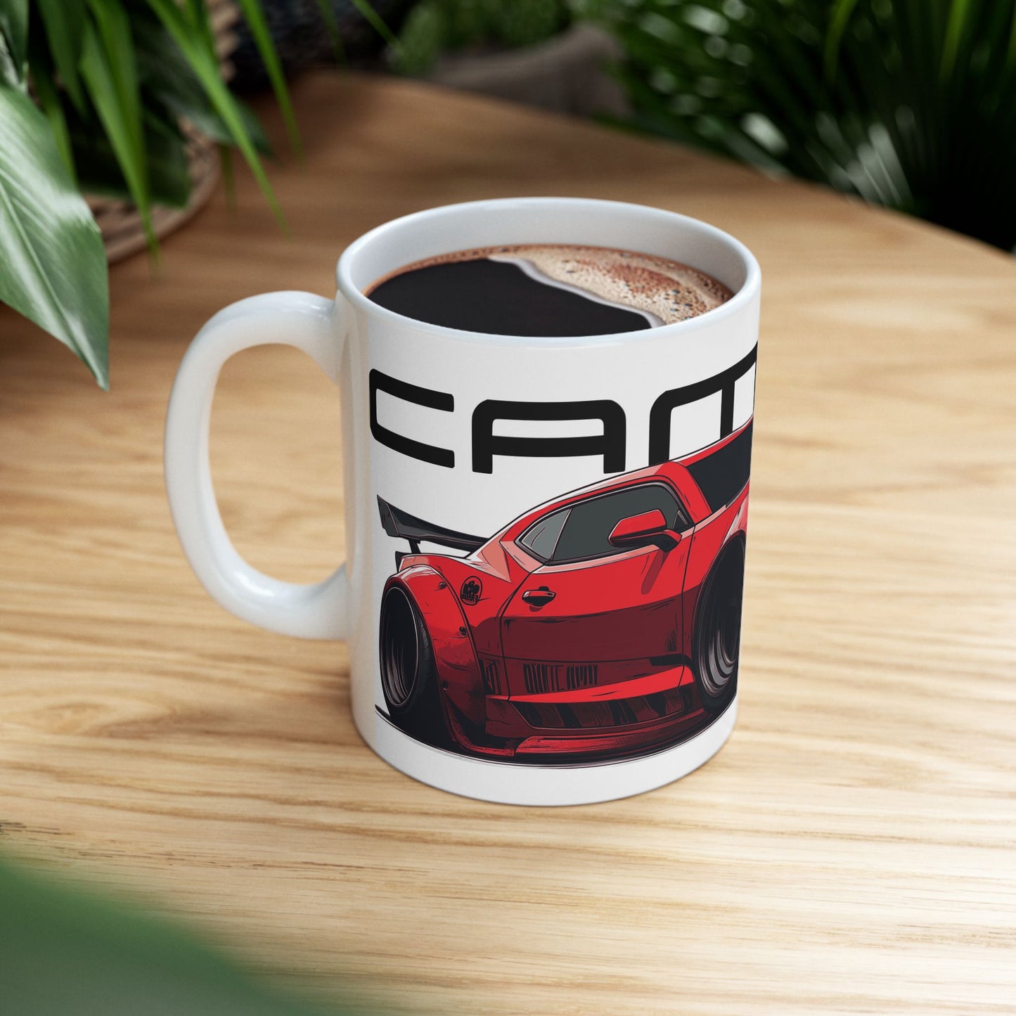 Lifestyle view of the 11oz White Coffee Mug with a Red Chevy Camaro with the Camaro emblem placed above the car.  