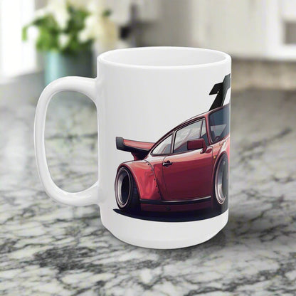 Left side view of the 15oz White Coffee Mug with a red Porsche 930 with the text 'turbo' placed behind the car. 