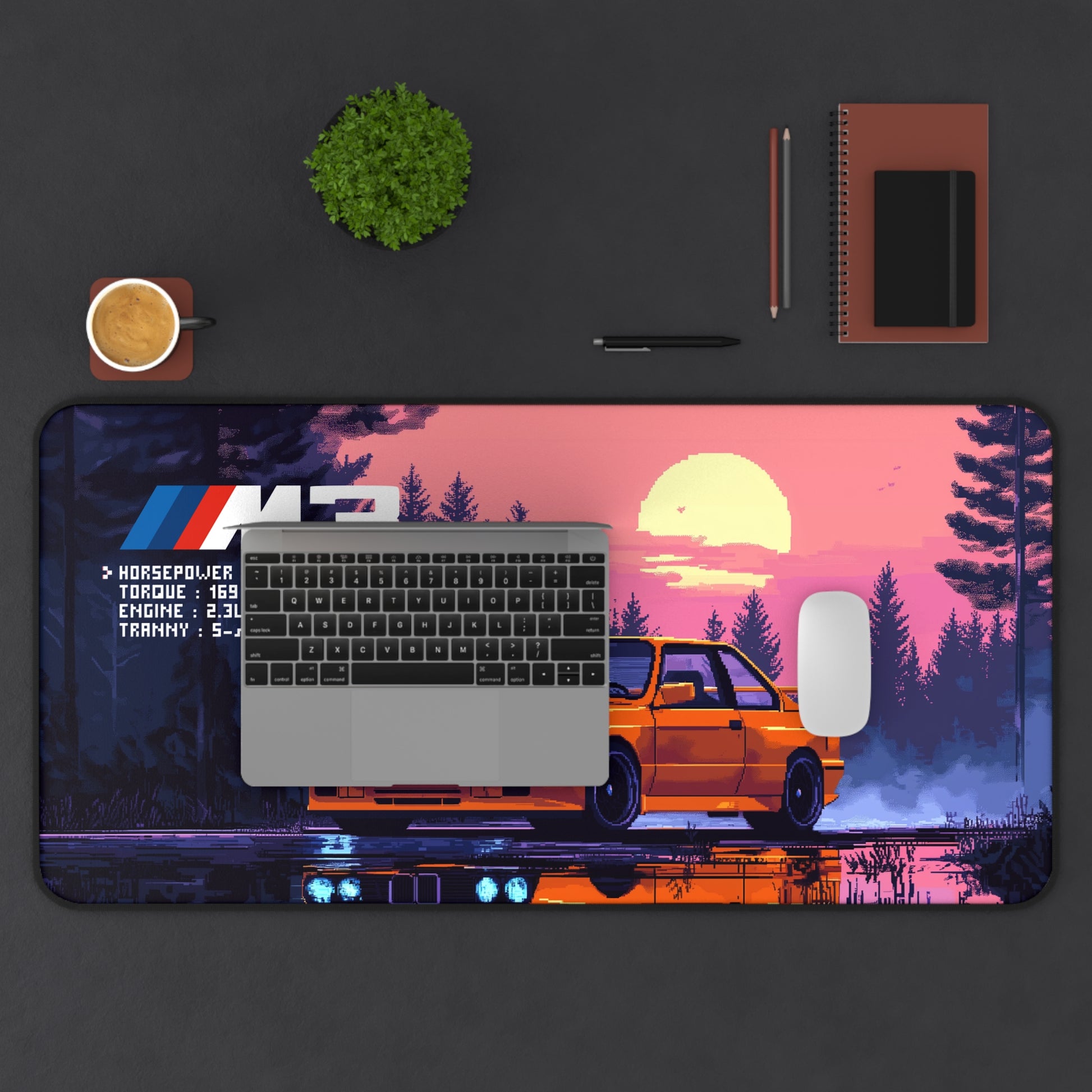 Top view of the 15.5 by 31 deskmat showing the BMW M3 E30 graphic with a laptop and mouse.