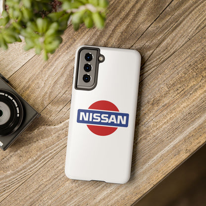 White Samsung Galaxy S21 Vintage Nissan phone case on a table with accessories.