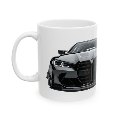 Left view of 11oz White Coffee Mug with a BMW M4 GTS with the M emblem placed beside the car.    