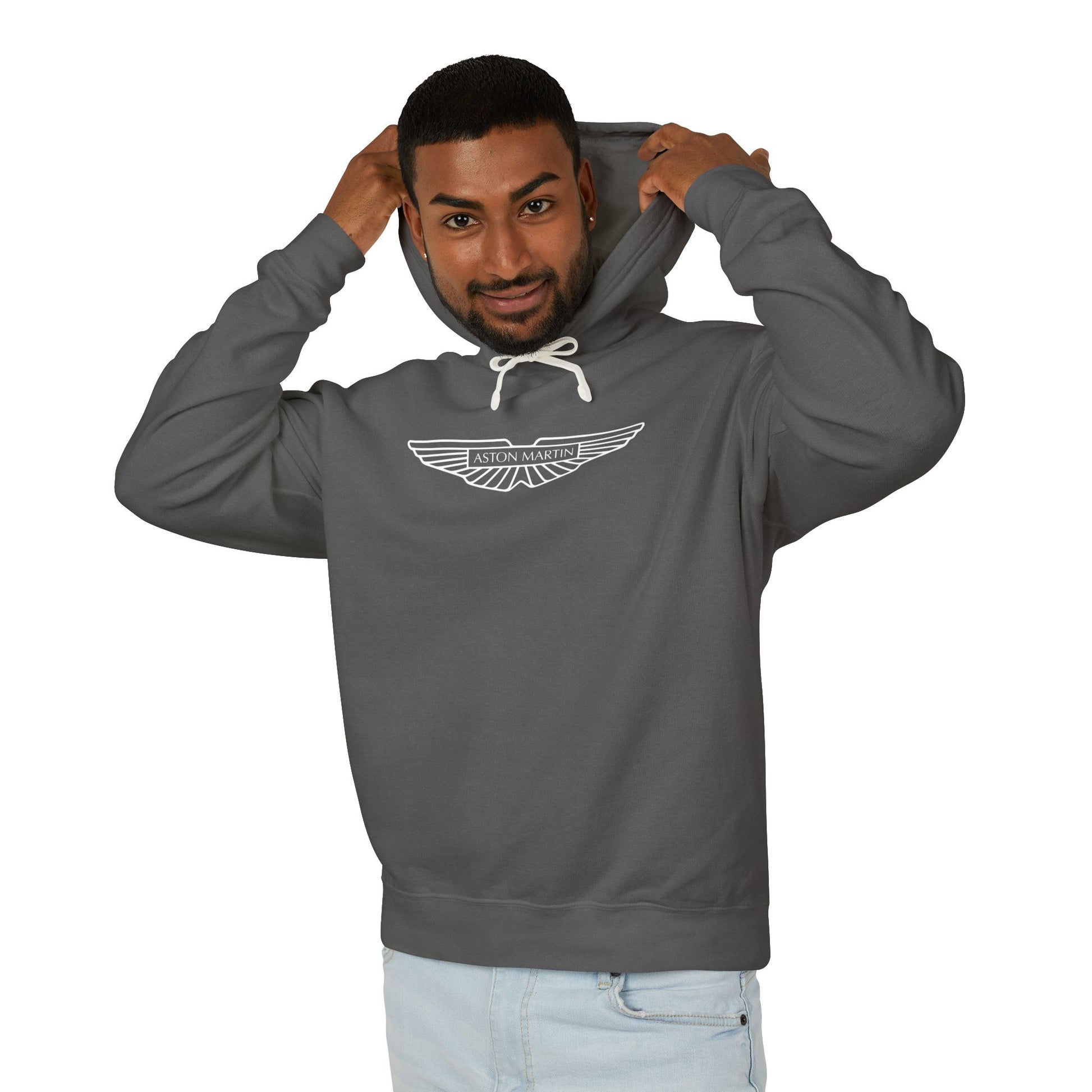 Model wearing a Pepper or Dark Grey Aston Martin hoodie with logo in white on the front, featuring a natural-colored flatcord hood.