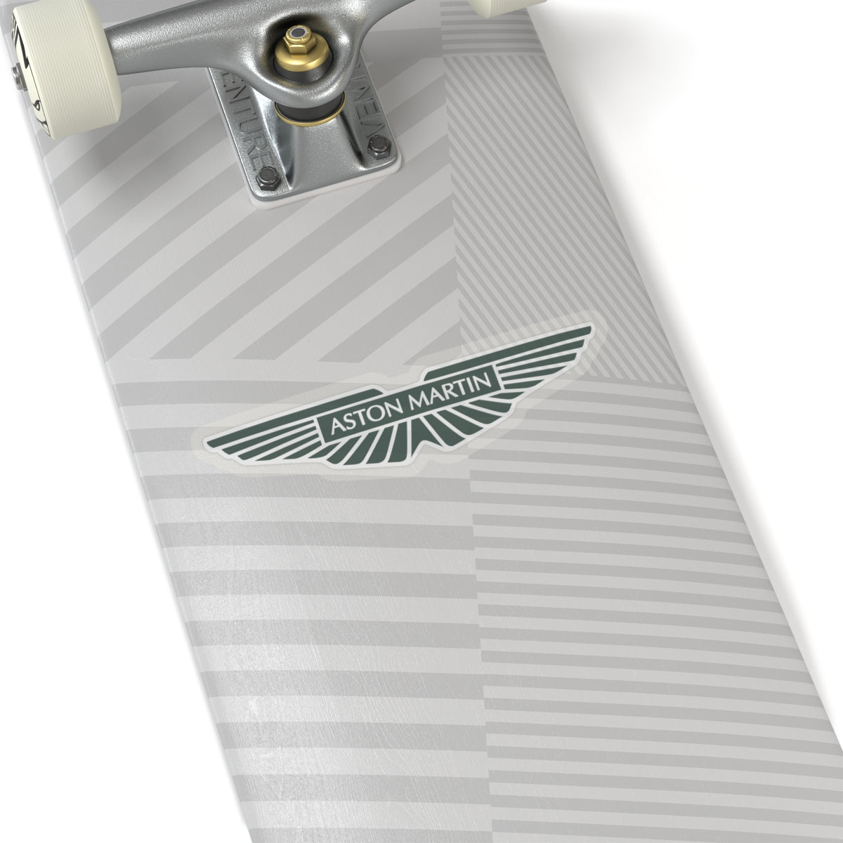 6 inch Aston Martin transparent sticker placed on a skateboard deck..