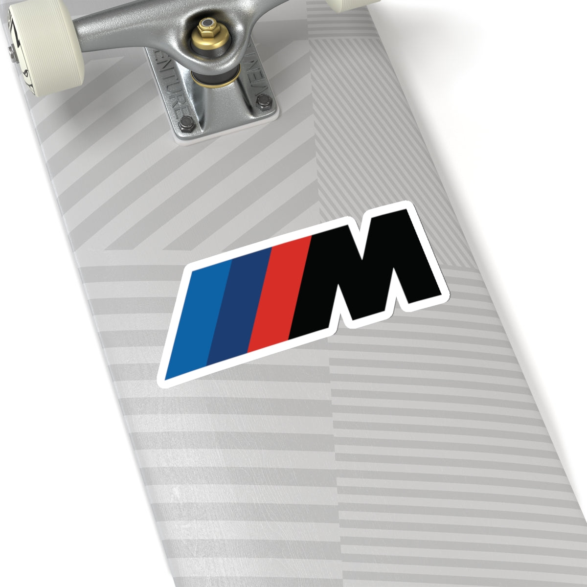 6 inch white sticker of the BMW Motorsport logo on skateboard for scale
