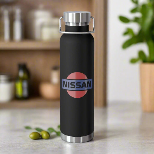 Front View of Black Vintage Nissan Logo Water Bottle in a kitchen. Nissan Themed Water Bottle.