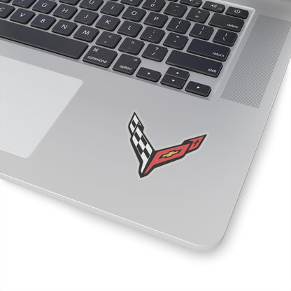 2 inch transparent sticker of the Corvette C8 emblem on laptop for scale