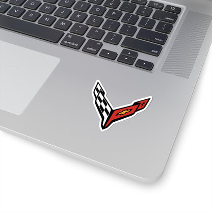 2 inch white sticker of the Corvette C8 emblem on laptop for scale
