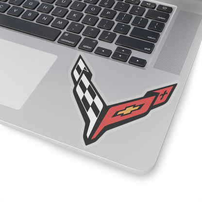 4 inch transparent sticker of the Corvette C8 emblem on laptop for scale
