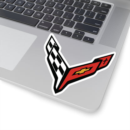 4 inch white sticker of the Corvette C8 emblem on laptop for scale
