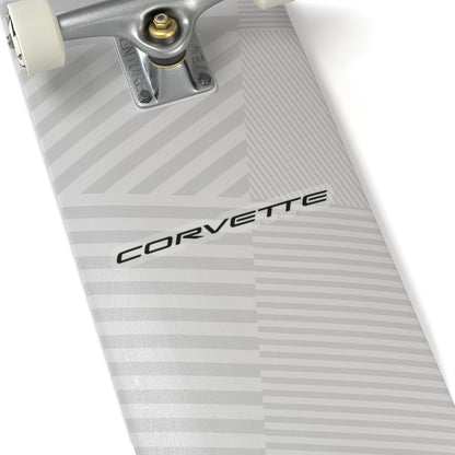 6 inch transparent Corvette sticker applied to a silver skateboard, showcasing its size and placement.