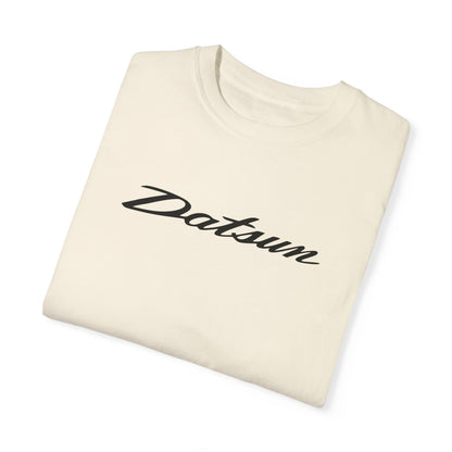 Ivory Datsun T-Shirt with black text, folded.
