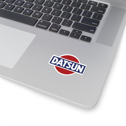 2 inch whtie Vintage Datsun sticker on a silver laptop