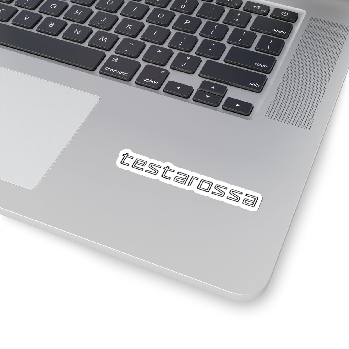 3 inch white Testarossa sticker on a silver laptop