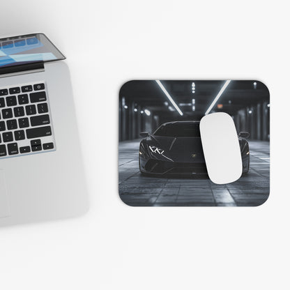 Lamborghini Huracan mouse pad and mouse placed beside a laptop