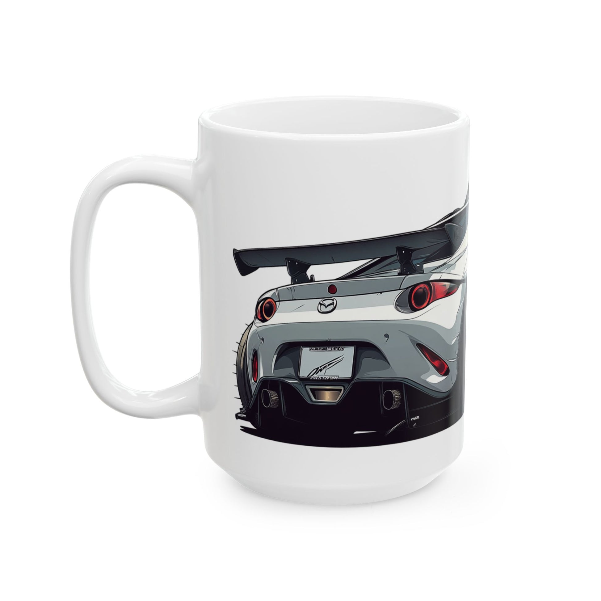 Left side view of the 15oz White Coffee Mug with a Mazda MX-5 with the MX-5 emblem placed behind the car. 