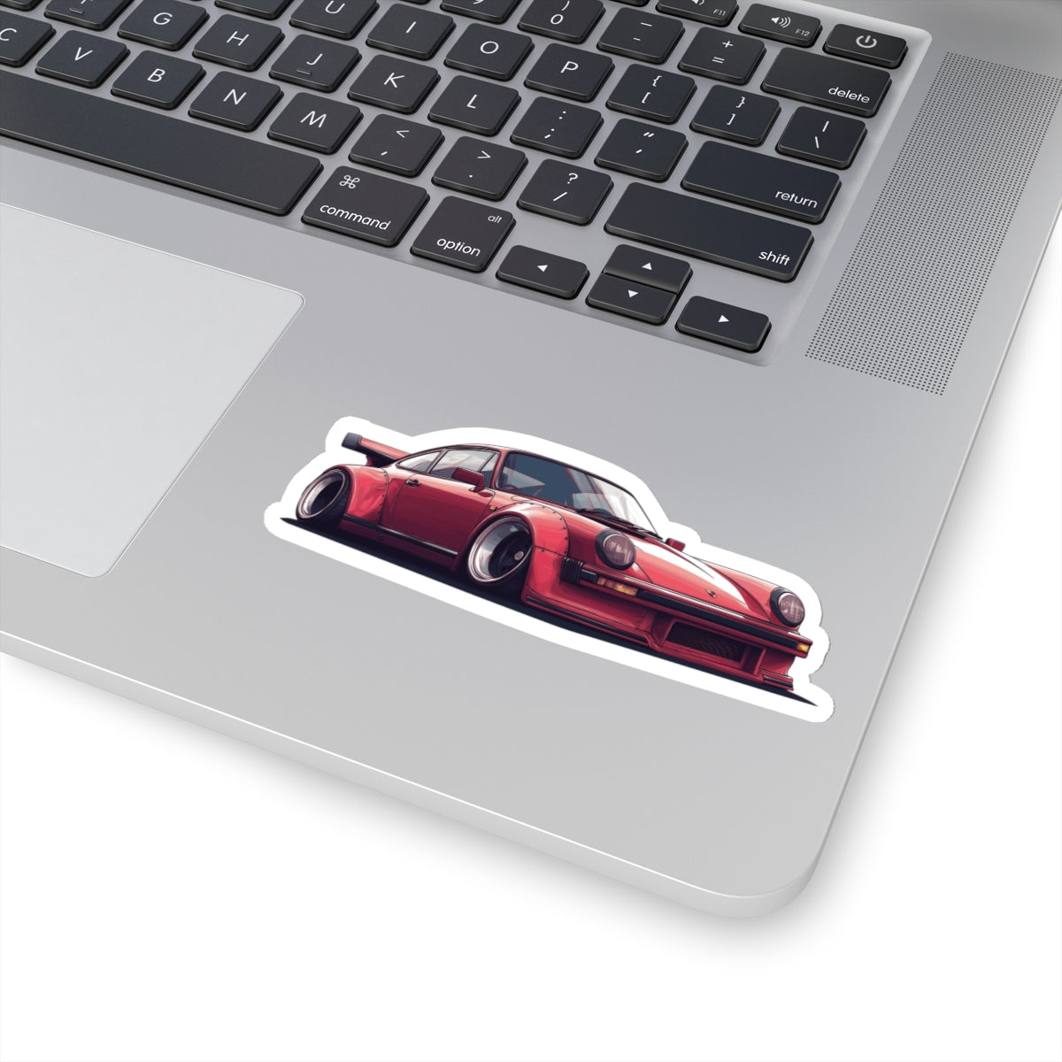 4 inch white Porsche 930 sticker on a silver laptop