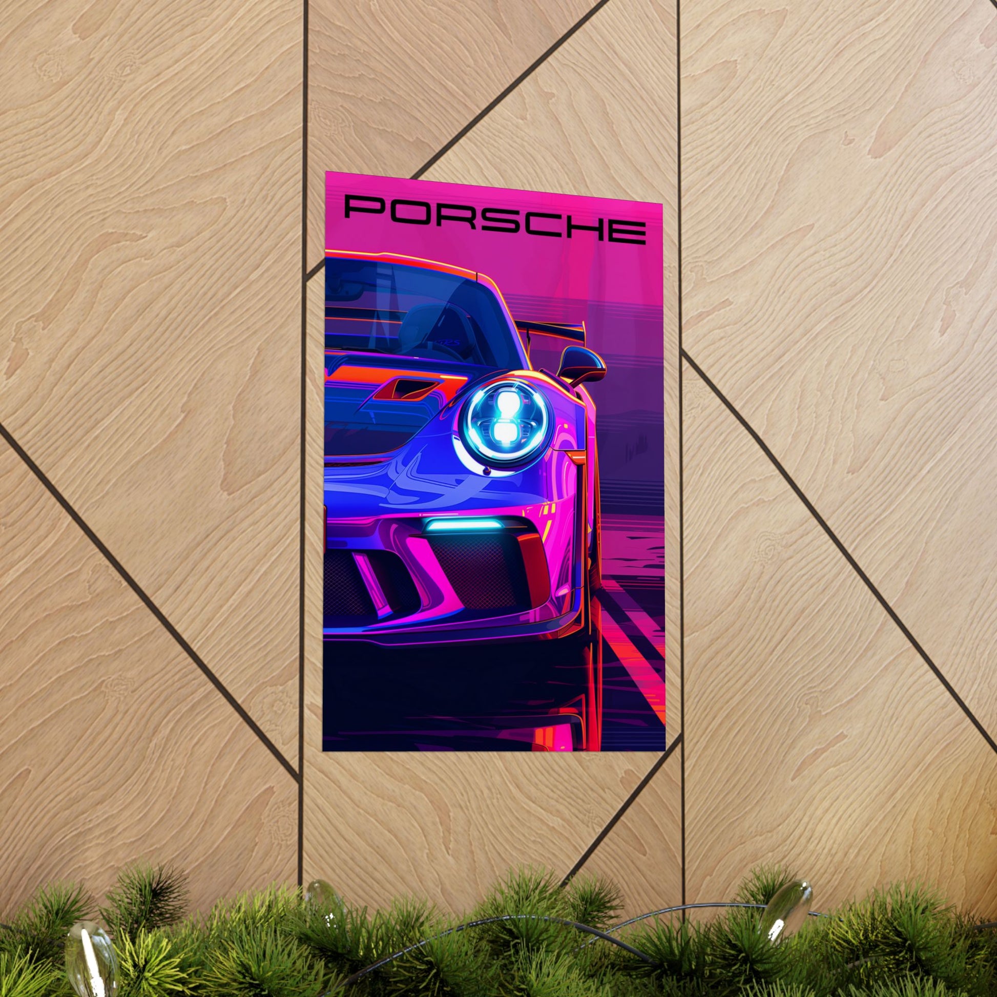 Porsche GT3RS poster displayed on a wooden wall.