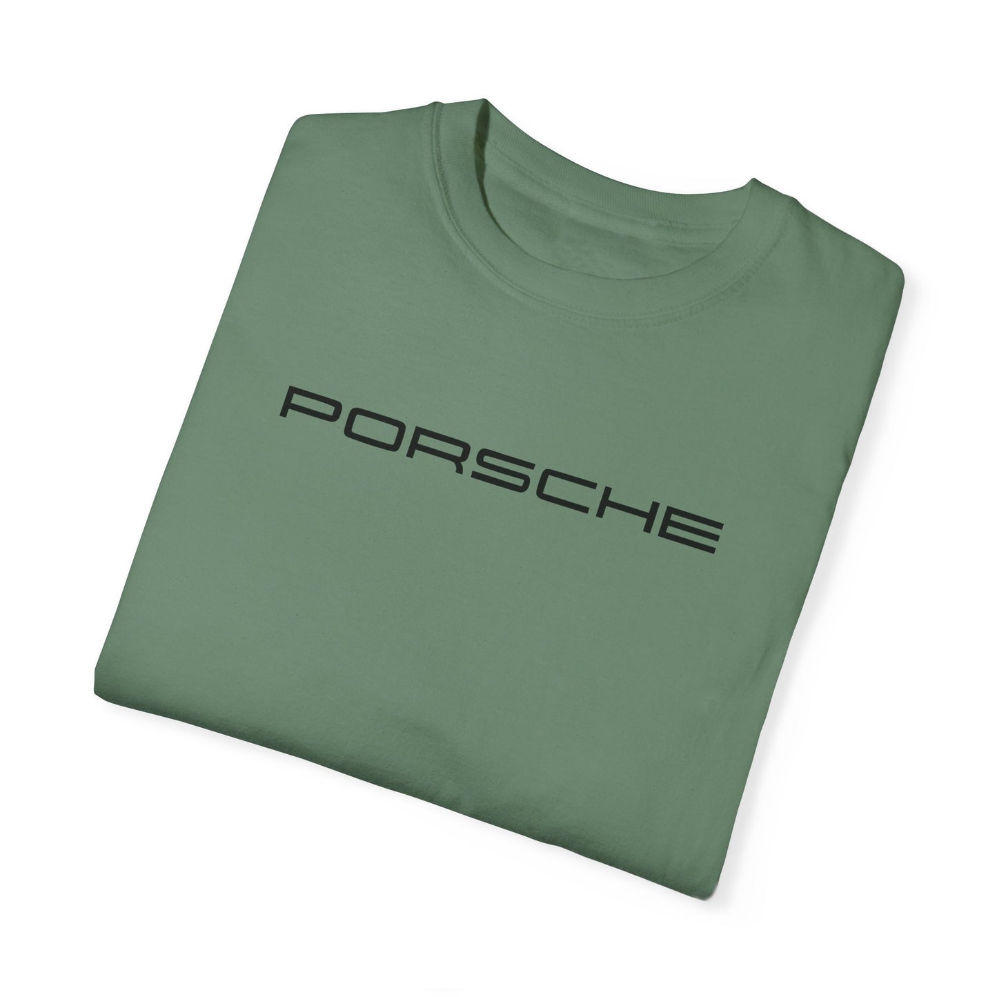 Green Porsche T-Shirt with black text, folded.
