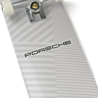 6 inch Transparent Porsche text logo sticker on skateboard for scale
