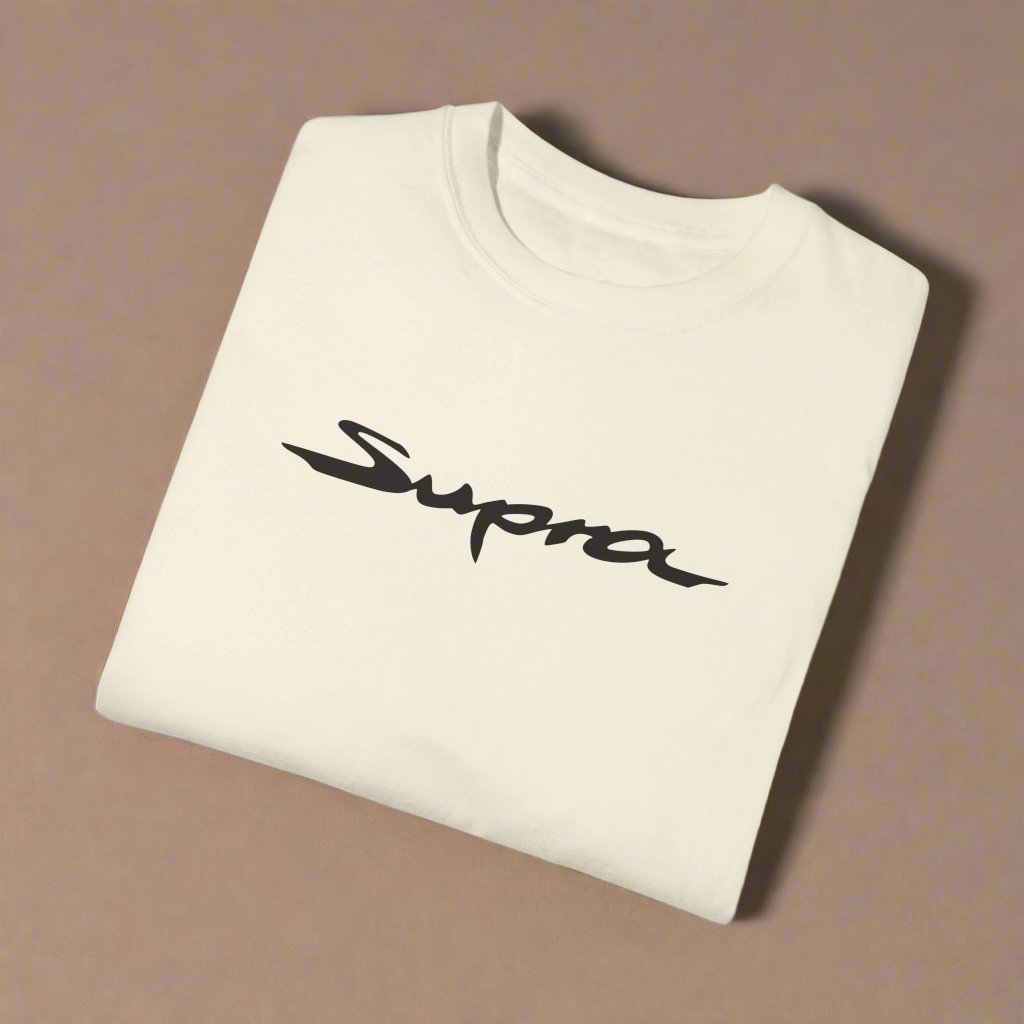 Ivory Toyota Supra T-Shirt with black text, folded. Shirts for car fanatics
