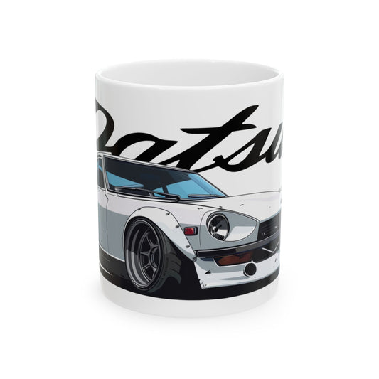 11oz White Coffee Mug with a Datsun 240z with the Datsun emblem placed behind the car. 