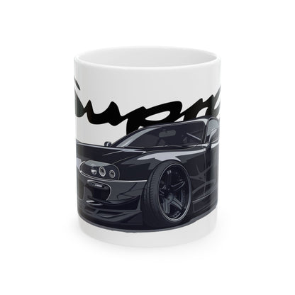 11oz White Coffee Mug with a 4th Generation Toyota Supra with the Supra emblem placed behind the car. 