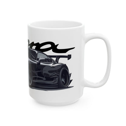 Right side view of the 15oz White Coffee Mug with a 4th Generation Toyota Supra with the Supra emblem placed behind the car. 