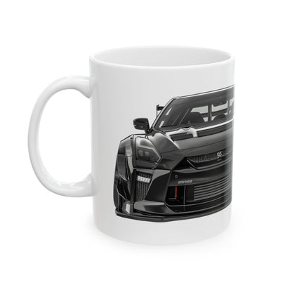 Left view of 11oz White Coffee Mug with a Nissan GTR with the GTR emblem placed behind the car.  