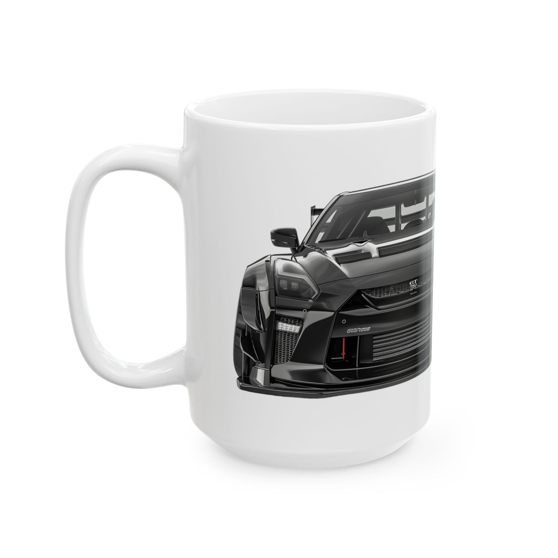 Left side view of the 15oz White Coffee Mug with a Nissan GTR with the GTR emblem placed behind the car. 