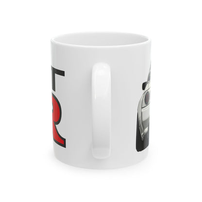 Mug handle view of 11oz White Coffee Mug with a Nissan Skyline R32 with the GTR emblem placed behind the car. 