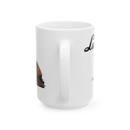 Mug handle view of 15oz White Coffee Mug with a Lamborghini Huracán with the Lamborghini emblem placed behind the car. 