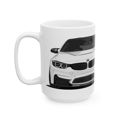 Left side view of the 15oz White Coffee Mug with a White BMW M4 with the M emblem placed behind the car. 